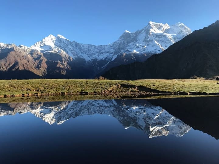 Budha Madhyamaheshwar reflection pond sunrise